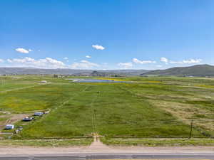 Aerial view of sparsely populated area with a mountainous background