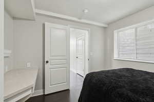Bedroom featuring baseboards