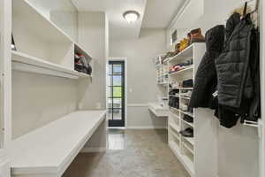 Spacious closet featuring carpet