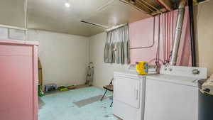 Laundry room with washing machine and dryer