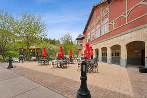 View of property's community featuring outdoor dining area