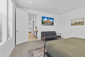 Bedroom featuring carpet, baseboards, and recessed lighting