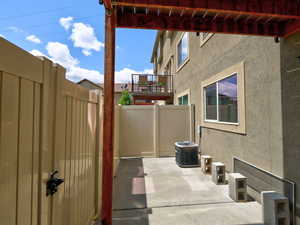 View of patio / terrace with fence and central AC unit