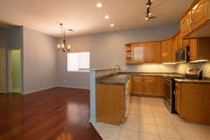 View of kitchen, living room, and laundry room