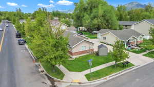 Aerial view of property with mountainous background