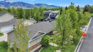 Aerial view of residential area featuring mountains