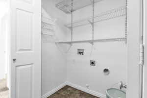 Laundry room featuring electric dryer hookup, washer hookup, baseboards, and gas dryer hookup