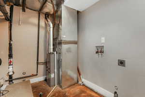 View of utility room and second laundry area.