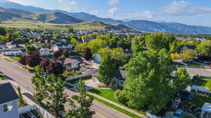 Aerial view of residential area featuring mountains