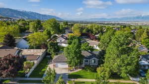 Aerial view of residential area with a mountain backdrop