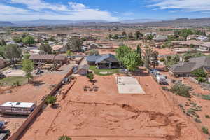 Aerial perspective of suburban area with a mountain backdrop