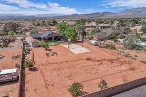 Aerial view of residential area with a mountainous background