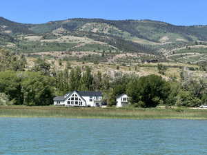 View of mountain background featuring a large body of water