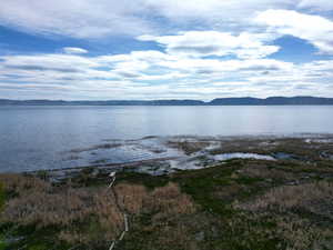 Water view with a mountainous background