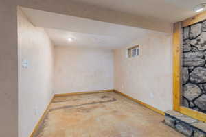 Finished basement featuring baseboards