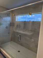 Bathroom with a shower stall