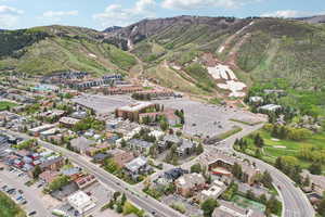 Aerial view of property's location with mountains