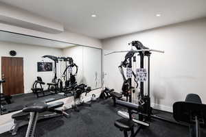 Gym featuring recessed lighting and baseboards