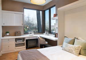 Bedroom with light wood finished floors