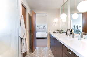 Ensuite bathroom featuring vanity