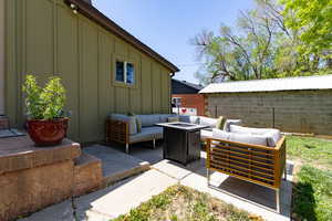 View of patio with an outdoor living space