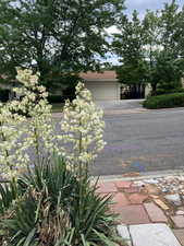 View of side of property with driveway