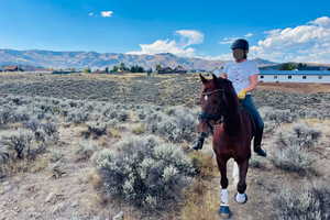The property is adjacent to municipal open space with direct access to miles of scenic trails.