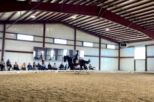 The indoor riding arena, measuring 75-by-150 feet, is lined with 6-foot square insulated windows that fill the space with natural light and open easily to provide an east/west cross breeze in summer months.