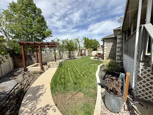 View of yard with a pergola
