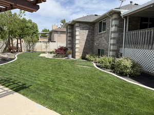 View of yard with a pergola
