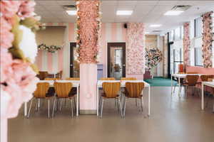 Building lobby with a paneled ceiling and a high ceiling