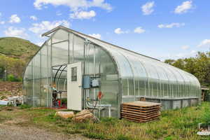 View of greenhouse with a mountain view