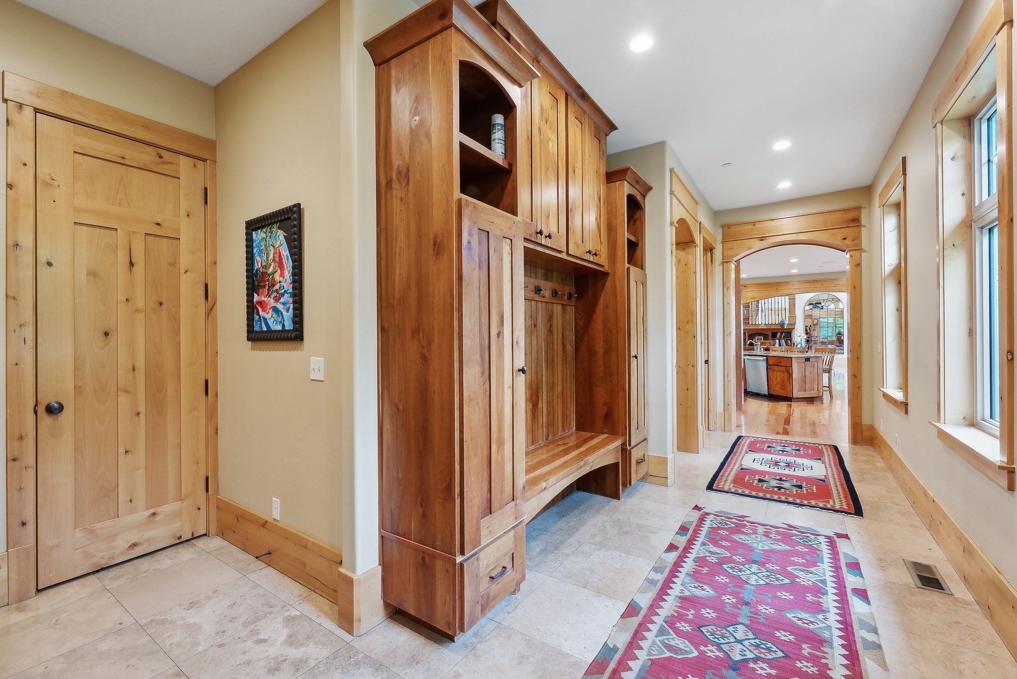 Mudroom featuring baseboards and recessed lighting