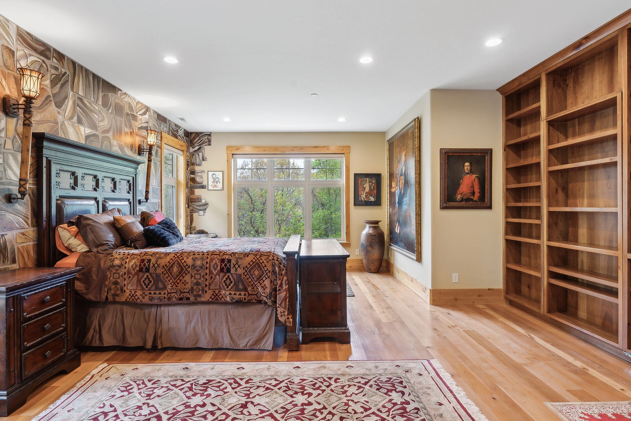 Bedroom with recessed lighting, light wood-style flooring, and baseboards