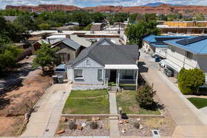 Aerial view of residential area with a mountainous background