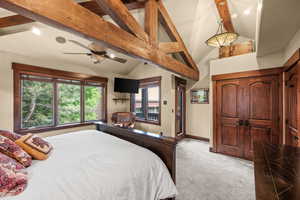 Carpeted bedroom with recessed lighting and baseboards