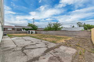 View of fenced backyard