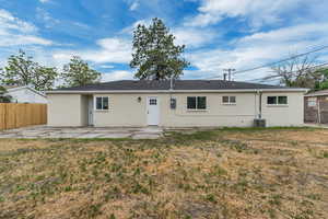 Rear view of property featuring a patio