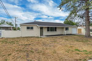 View of front facade featuring a garage