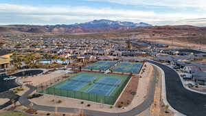 Aerial view of residential area featuring a mountain backdrop