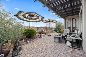 View of patio with a pergola