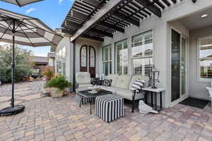 View of patio / terrace featuring a pergola and outdoor lounge area