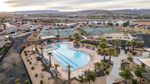 Aerial view of a mountainous background and a pool area