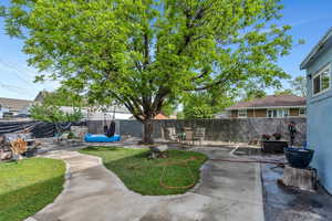 View of yard with a patio area