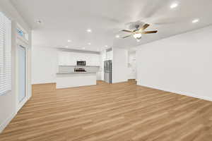 View of living room and kitchen
