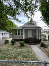 Bungalow-style house featuring a porch