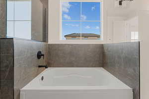 Bathroom featuring a bath