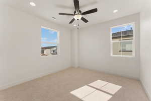 Unfurnished room with carpet floors, recessed lighting, ceiling fan, and baseboards