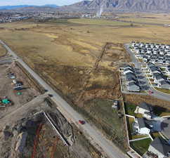 Aerial view of residential area with a mountain backdrop