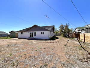 View of side of property featuring brick siding